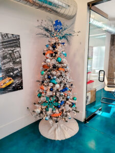 blue and orange and white christmas tree evolve