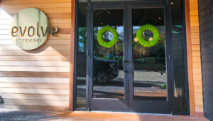 evolve doors with christmas wreaths