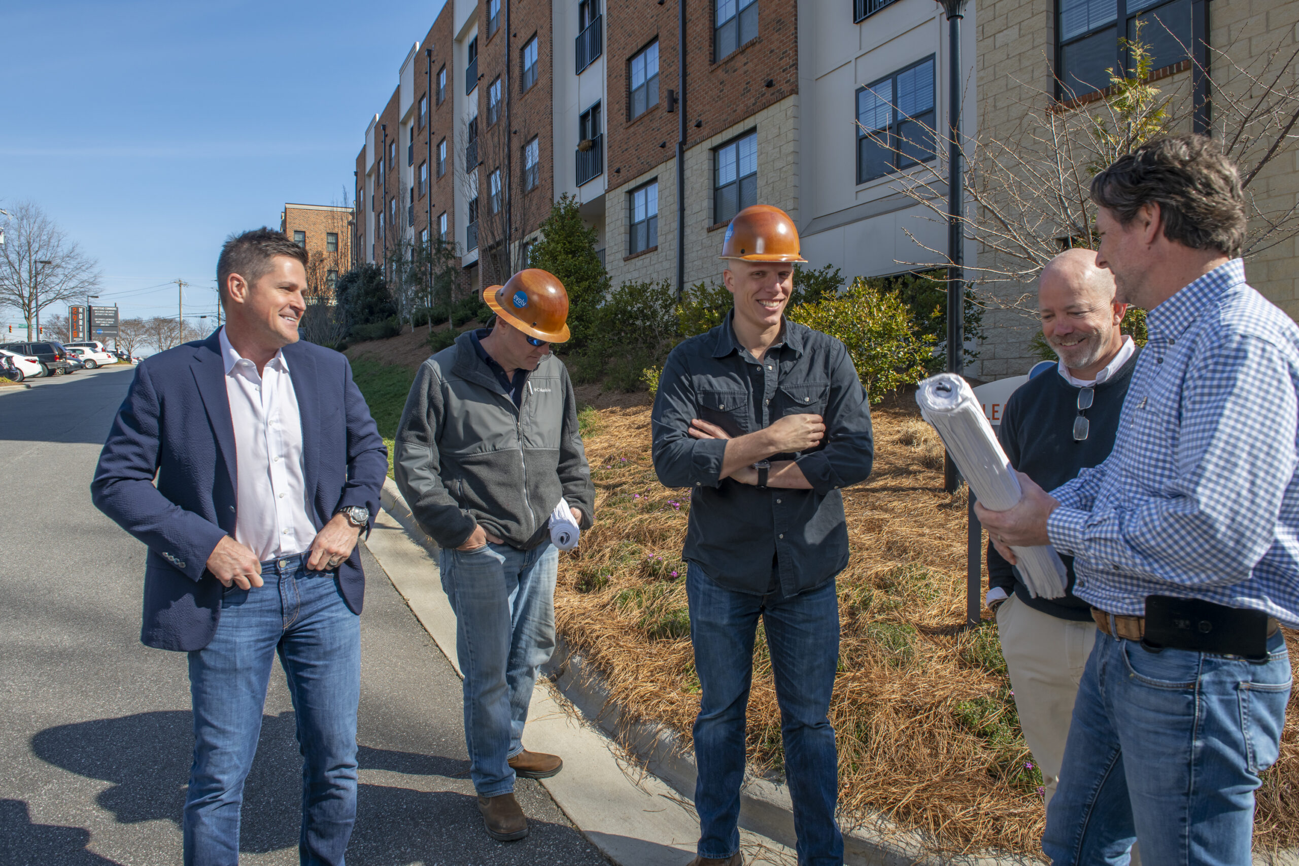 evolve-2022-roundup-blog-construction-hats-outdoor evolve 2022 roundup blog guys in construction hats outside