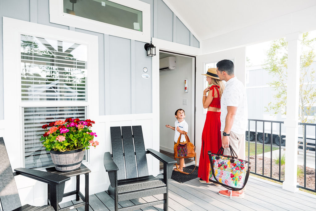 family walking into cabin at oceans rv resort