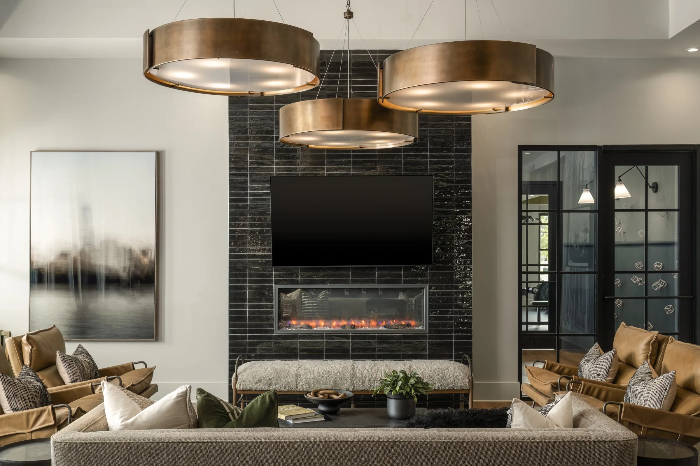 Evolve at the Pines clubhouse fireplace with black tiles