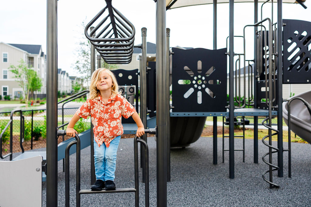 kid playing on playground at Evolve Waterford